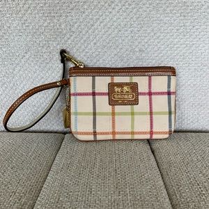 Coach Stripe pattern wallet wristlet.